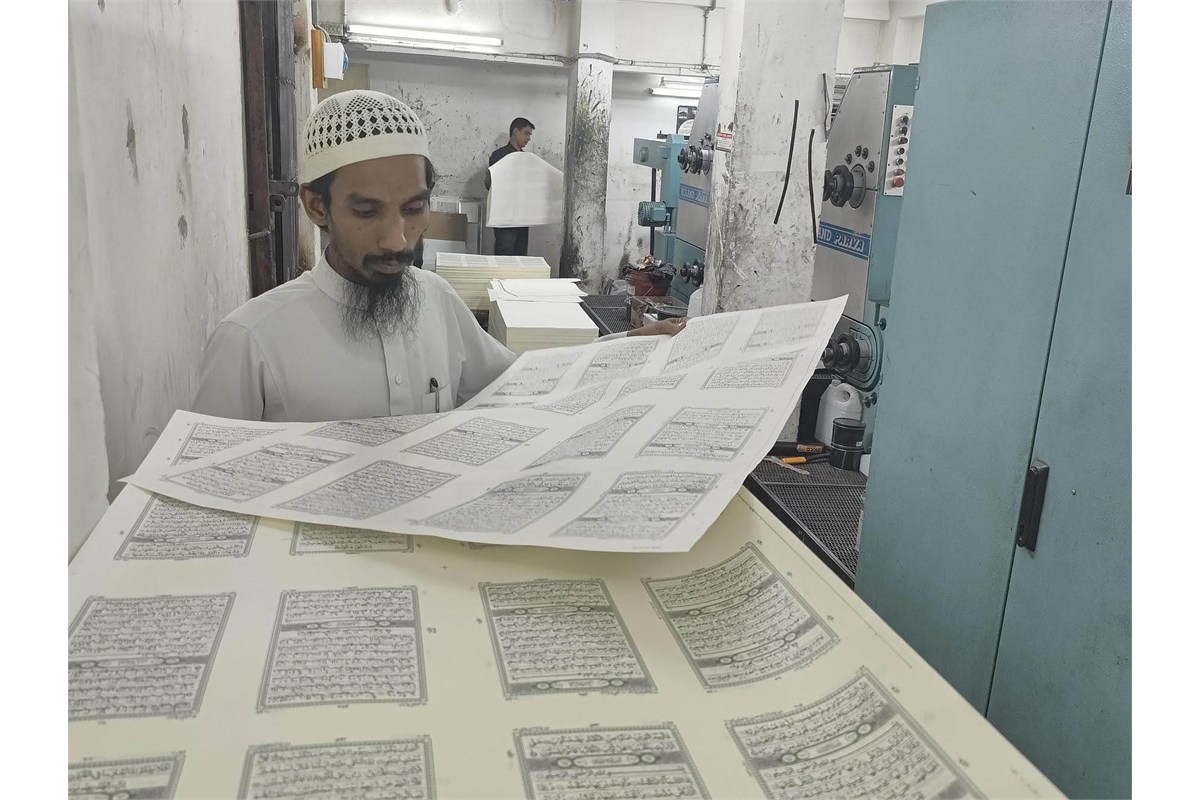Quality inspector checking page continuity