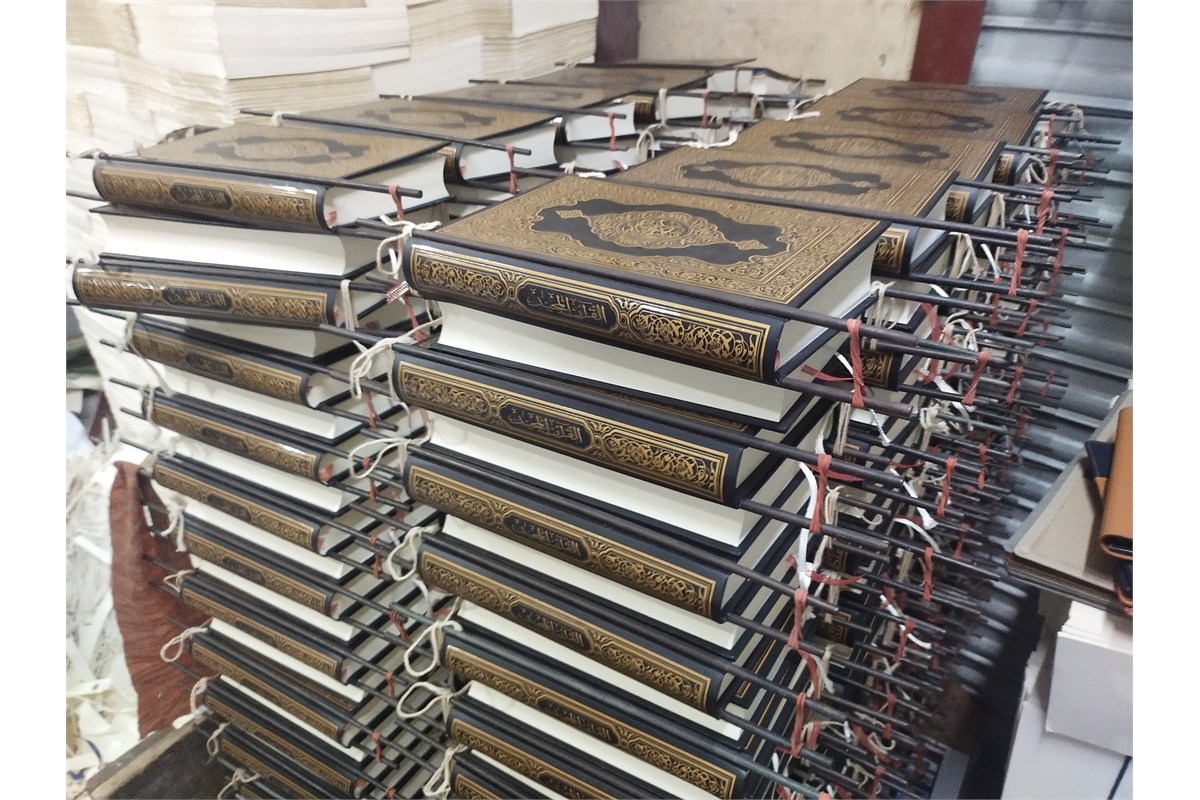 Packing Mushafs into cartons for shipment